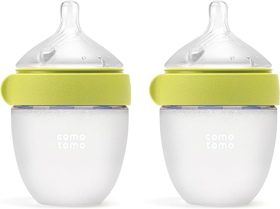 A newborn baby being bottle-fed by a parent in a softly lit living room, realistic family photography style