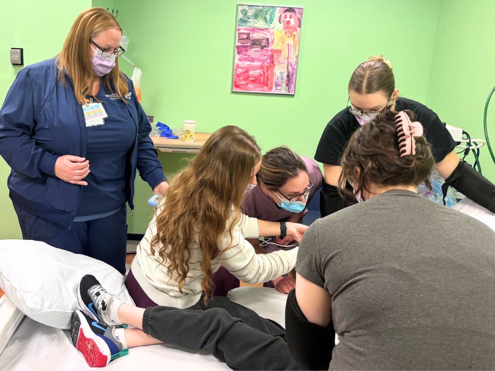 A pediatric dentist wearing gloves gently examining a toddler’s mouth in a dental clinic with a parent nearby, realistic photo