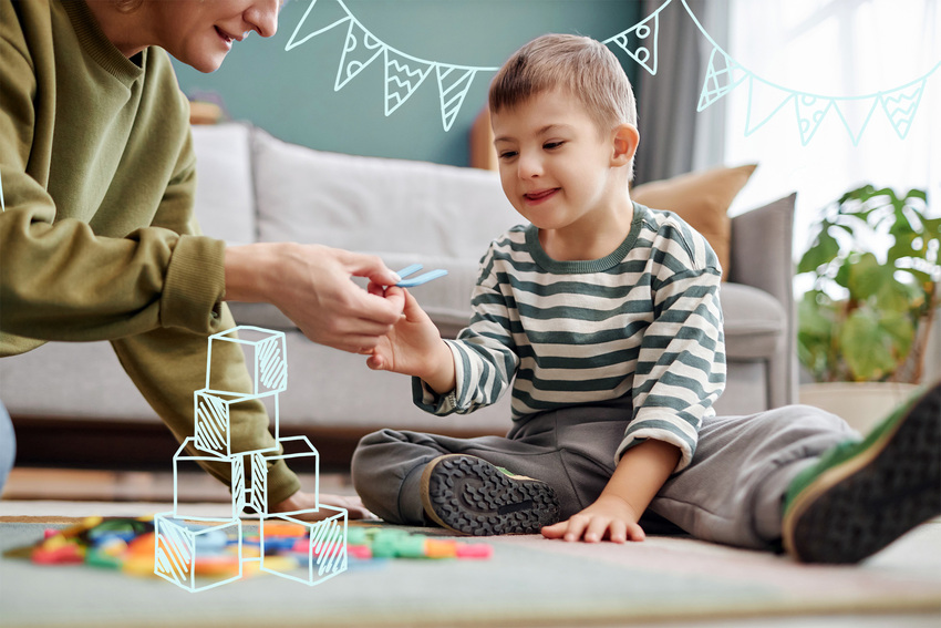 A toddler holding a parent's hand while standing in a pediatric clinic waiting room, candid photo