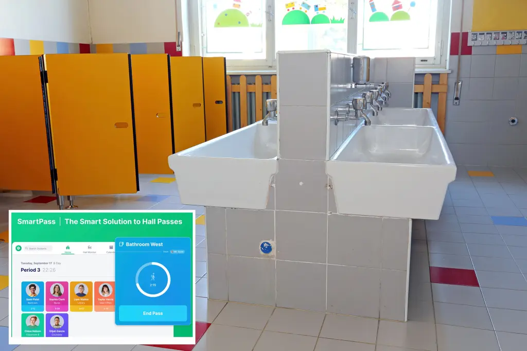 An elementary school aged child walking quickly toward a bathroom in a school hallway, natural candid photograph
